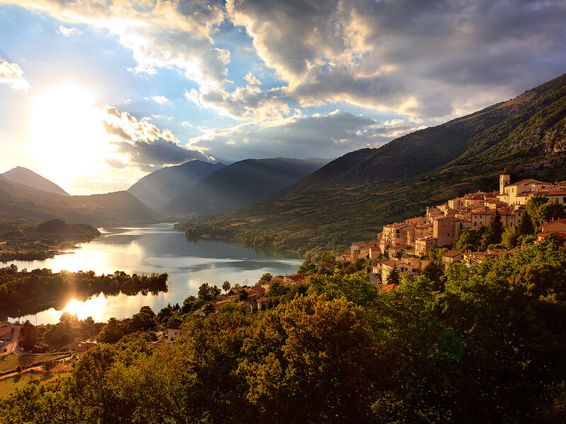 Village by the lake at sunset