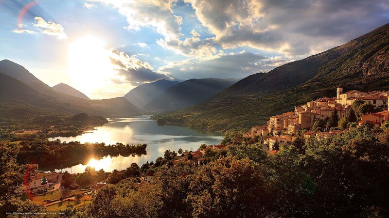 Village by the lake at sunset