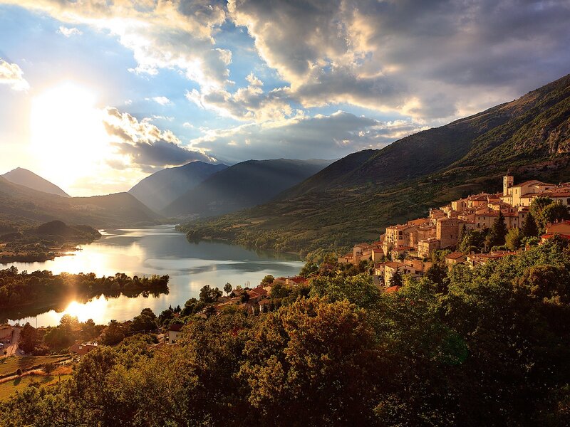 Village by the lake at sunset