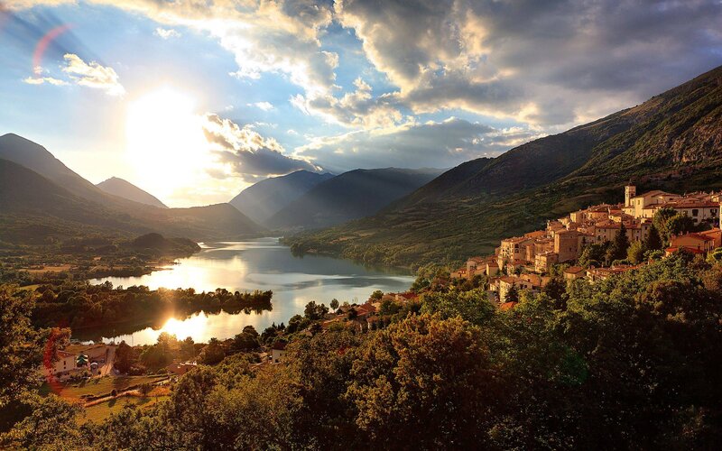 Village by the lake at sunset
