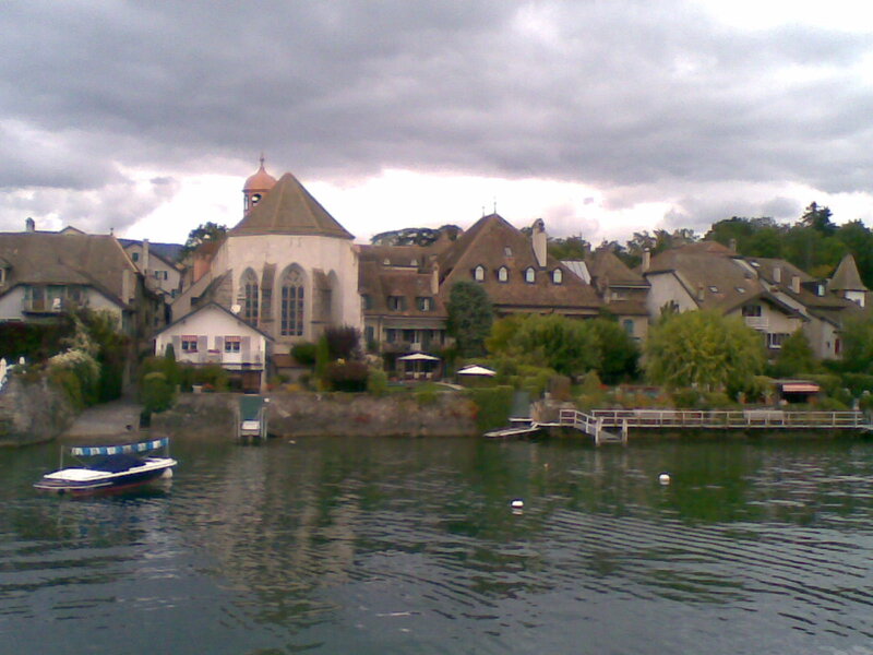 village by the lake with church