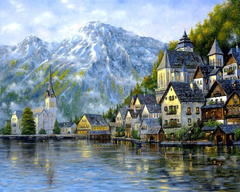 Village by the lake with mountains