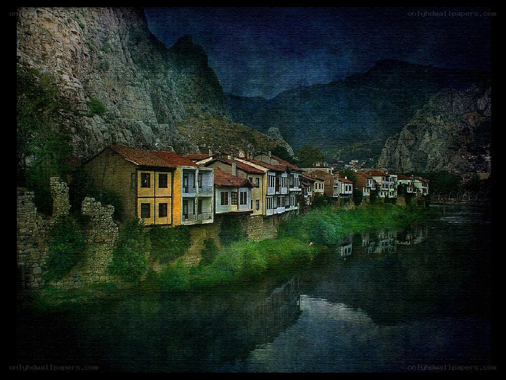 Village by the river at night