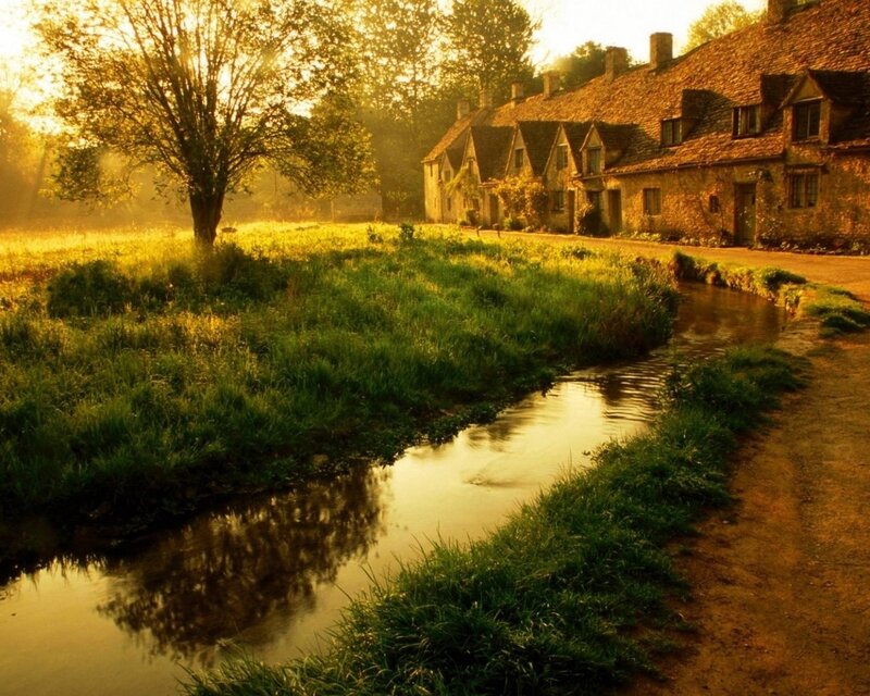 village by the river at sunrise
