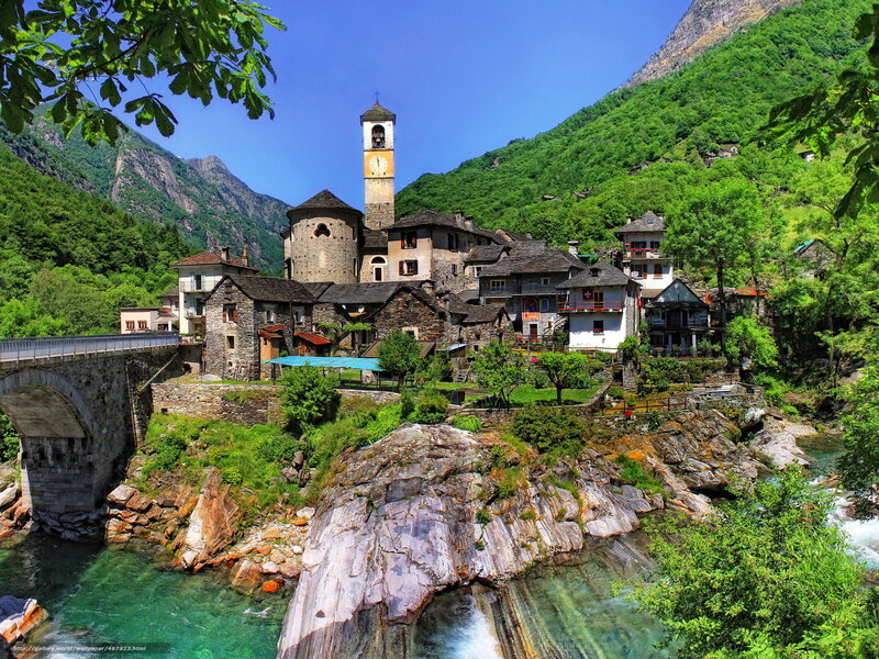 Village by the river in the Alps