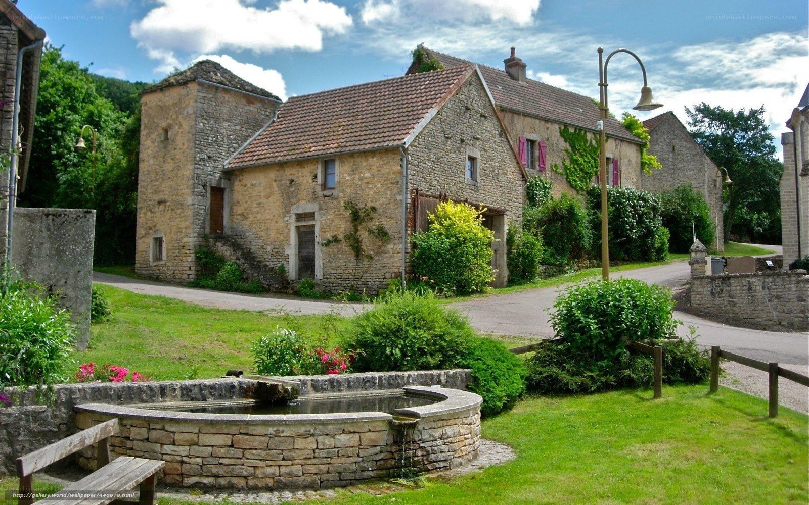 village fountain and stone houses
