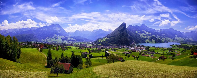 Village in Alpine Valley — Blue, Serene, Afternoon, Photograph