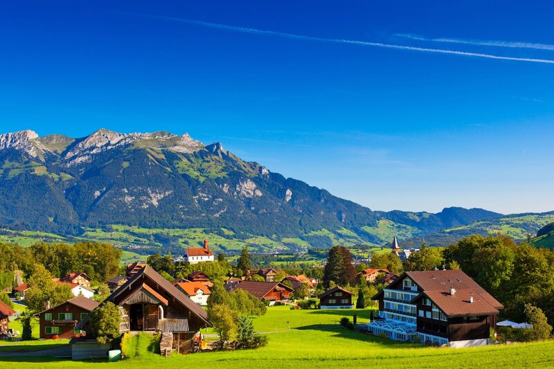 Village in Alpine Valley — Blue, Serene, Afternoon