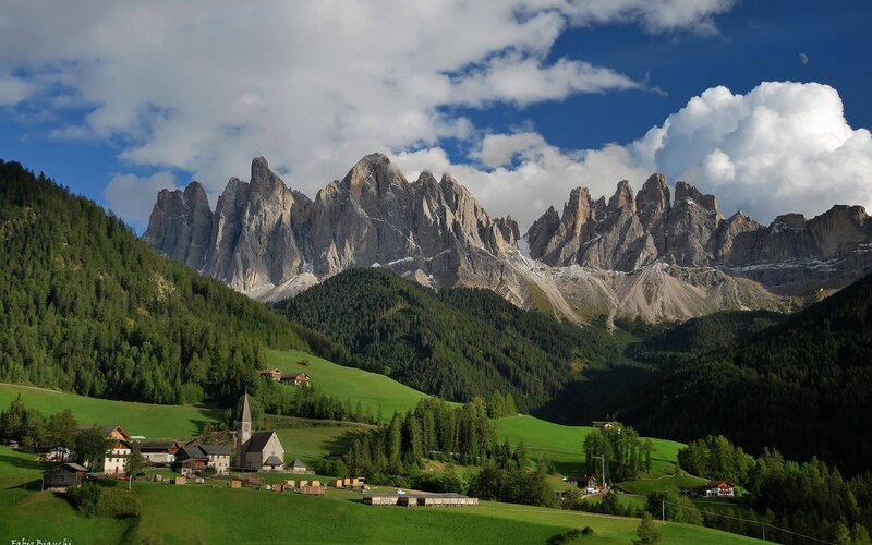 Village in Alpine Valley — Green, Serene, Afternoon, Photograph, Mountains, Church, Trees, Clouds