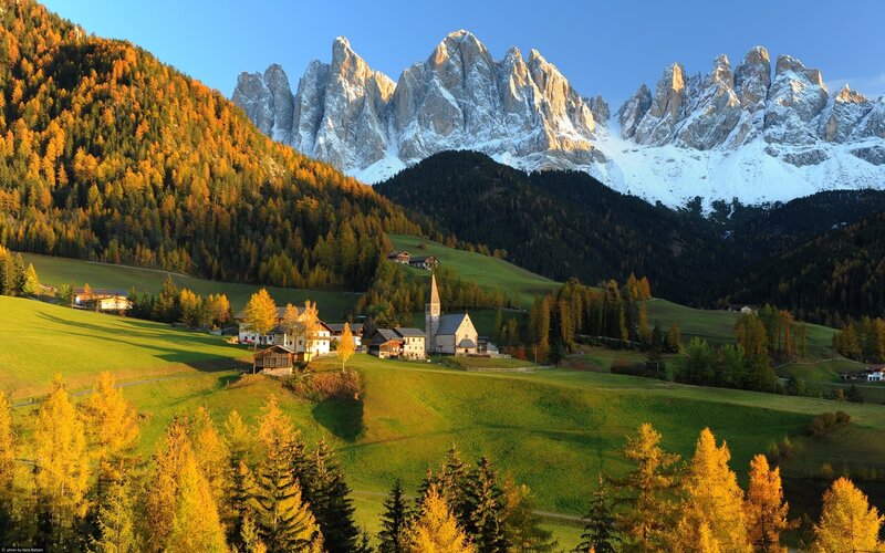 Village in Alpine Valley — Green, Serene, Autumn, Photograph, Mountains, Church, Forest, Hills