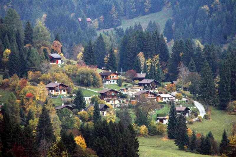 village in autumn forest