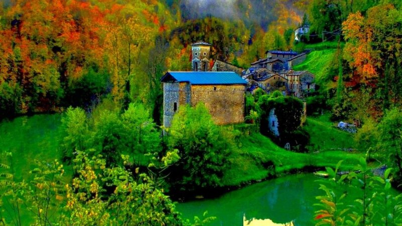 Village in Autumn Forest — Green, Serene