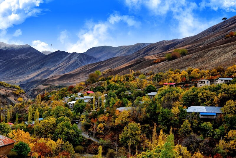Village in autumn mountains