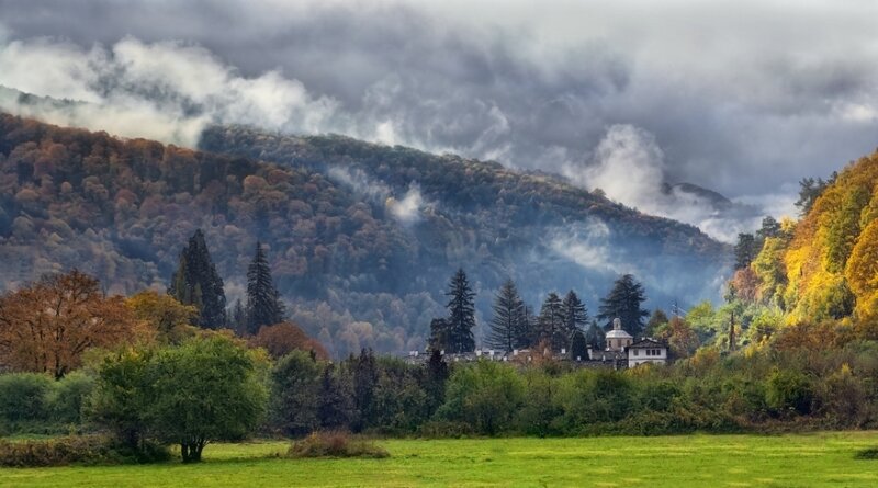 Village in Autumn Mountains — Green, Dramatic