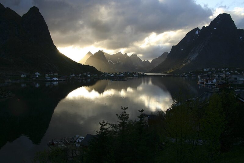 Village in Fjord at Sunset