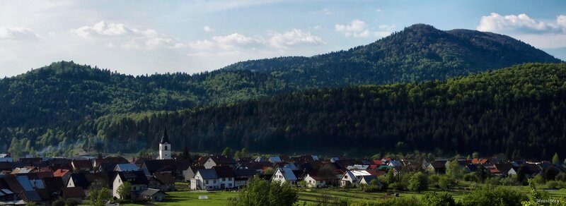 village in forested mountains