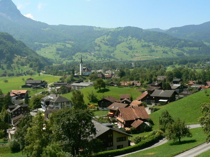village in green alpine valley