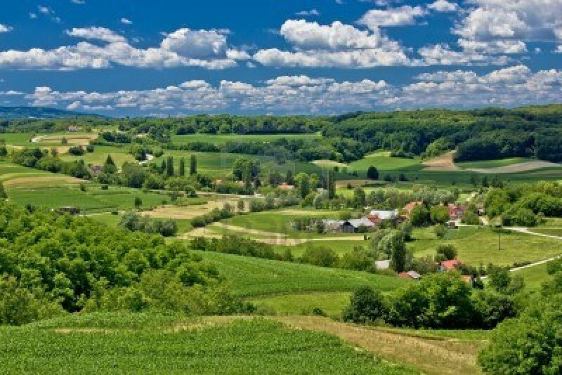 Village in Green Hills — Serene, Afternoon, Photograph, Fields