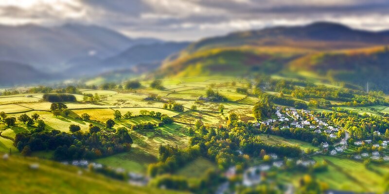 Village in Green Valley — Serene, Afternoon, Photograph, Mountains, Fields