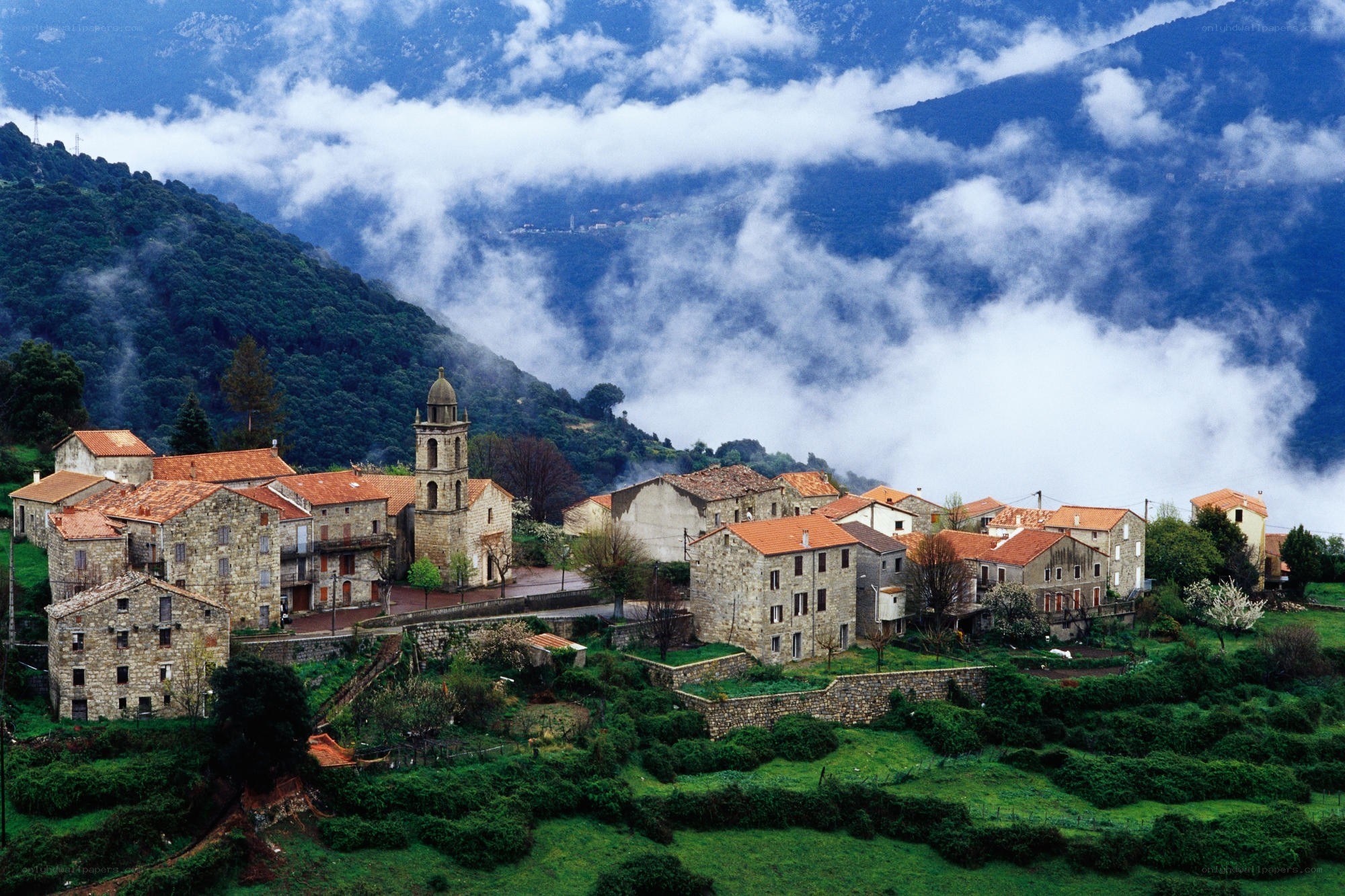 Village in mountain mist