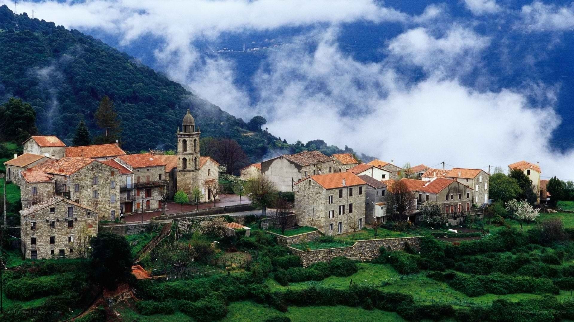 Village in mountain mist