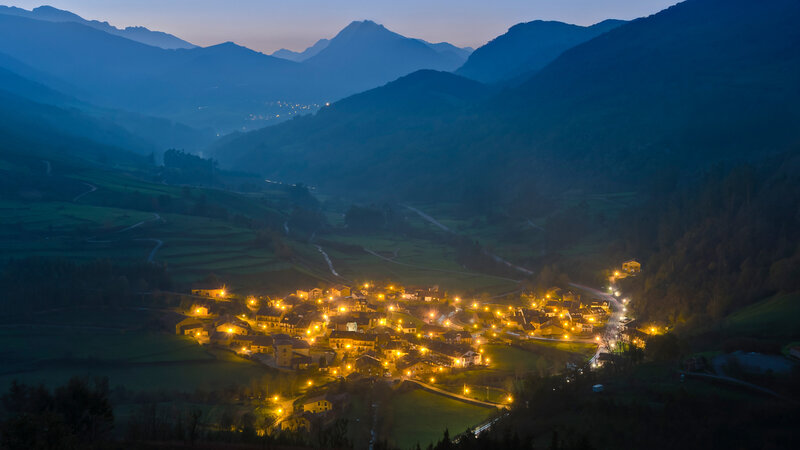 Village in Mountain Valley — Blue, Serene, Night, Photograph