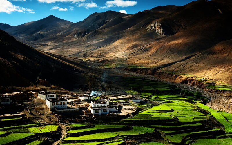 Village in Mountain Valley — Green, Dramatic, Afternoon, Photograph, Mountains