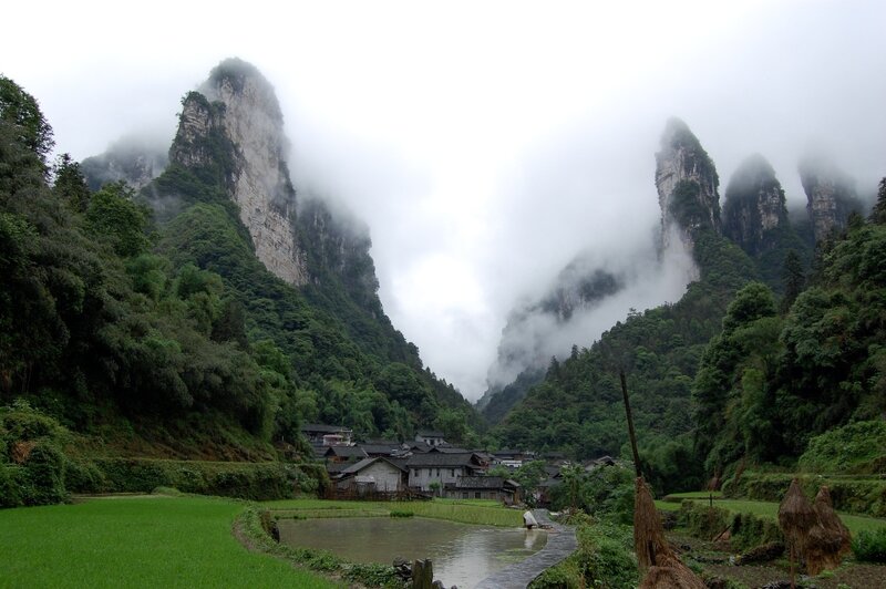 Village in Mountain Valley — Green, Misty, Photograph
