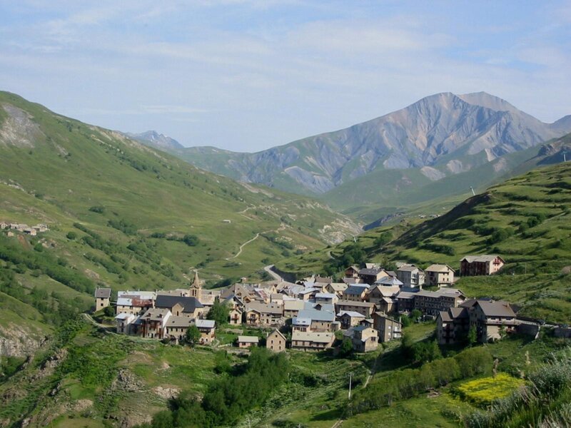 Village in Mountain Valley — Green, Serene, Afternoon, Photograph, Mountains, Church, Hills