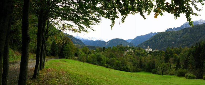 Village in Mountain Valley — Green, Serene, Autumn, Photograph, Trees, Mountains