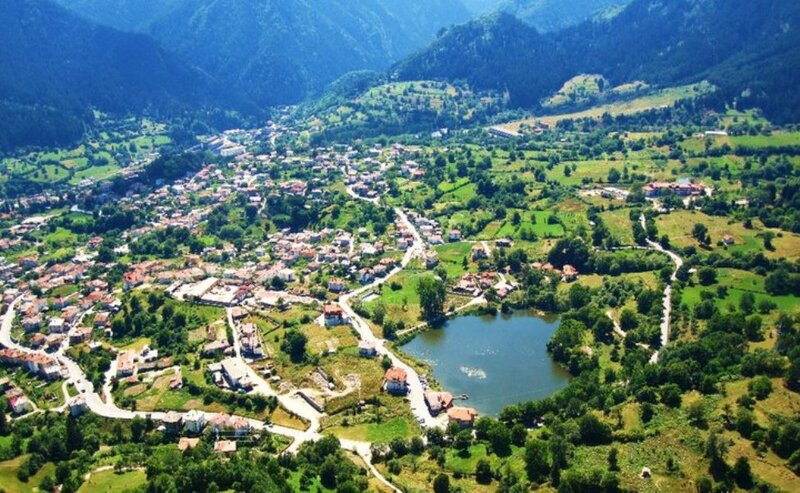 Village in Mountain Valley — Green, Serene, Daytime