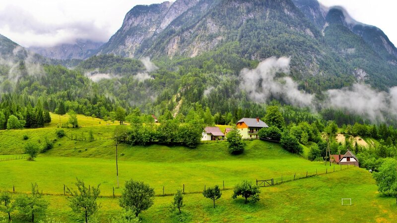 Village in Mountain Valley — Green, Serene, Morning, Photograph, Mountains, Farms