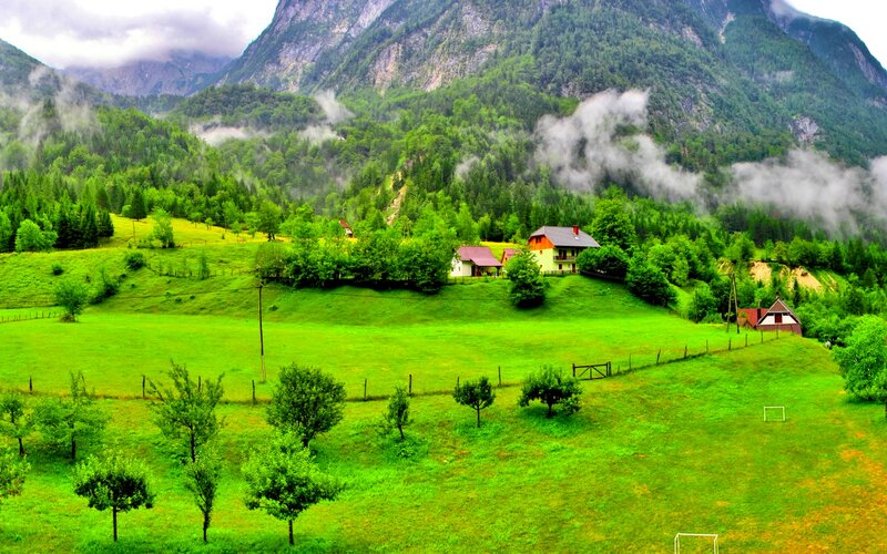 Village in Mountain Valley — Green, Serene, Morning, Photograph, Mountains, Fog, Houses