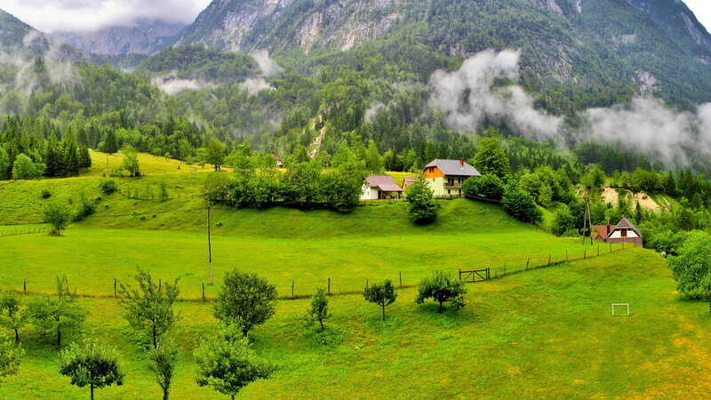 Village in Mountain Valley — Green, Serene, Morning, Photograph, Mountains, Fog, Houses, Trees