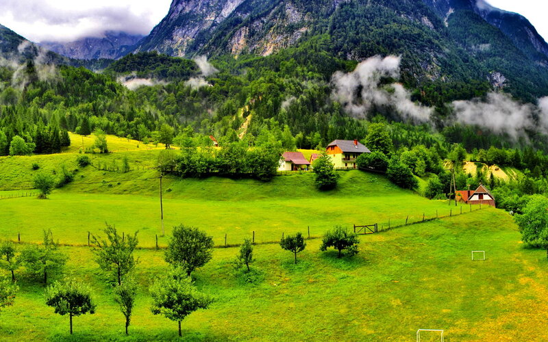 Village in Mountain Valley — Green, Serene, Morning, Photograph, Mountains, Hills, Houses