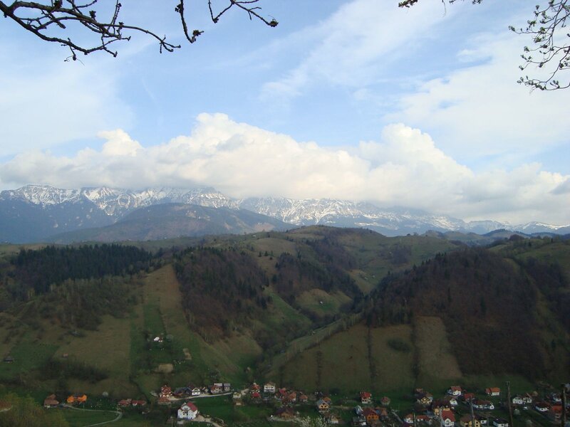 Village in Mountain Valley — Green, Serene, Spring, Photograph, Mountains, Clouds