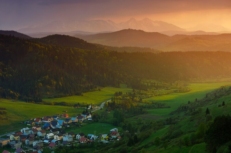 Village in Mountain Valley — Green, Serene, Sunset, Photograph, Mountains, Forests, Fields