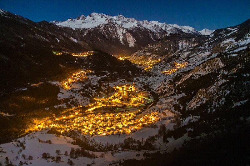 Village in snowy mountain valley