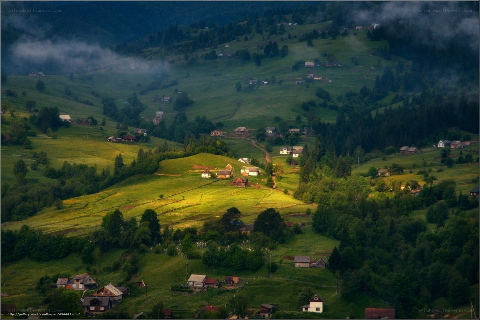Village in the misty hills