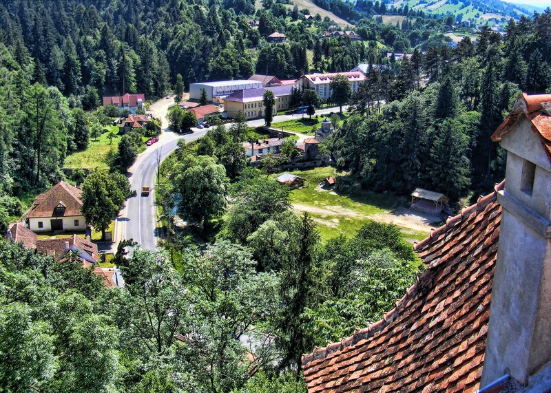 village nestled in a forested valley