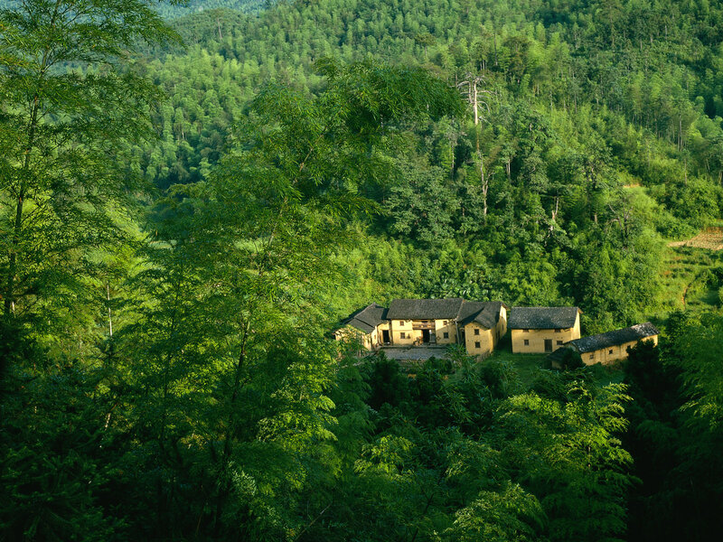 village nestled in green hills