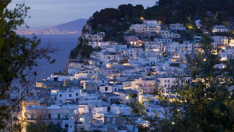 village on a cliff at dusk