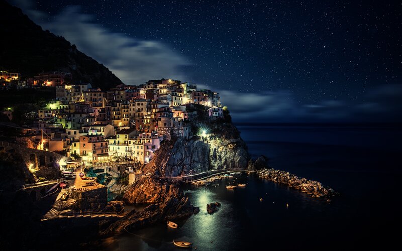 Village on a cliff at night