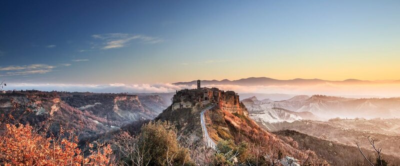 Village on a cliff at sunrise