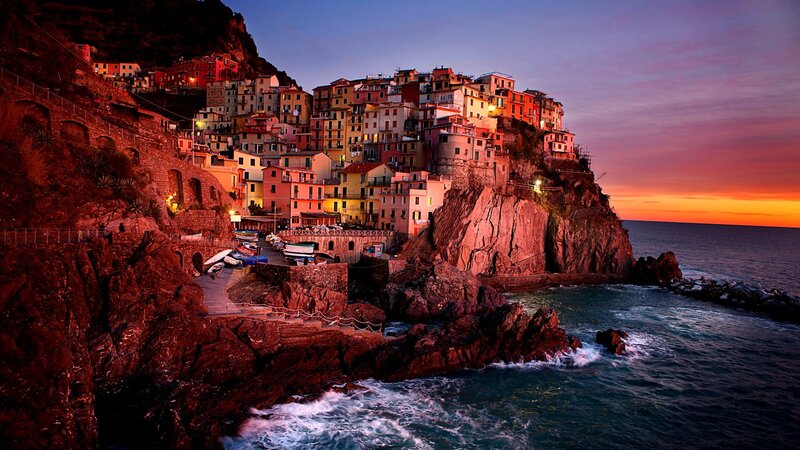 Village on a cliff at sunset