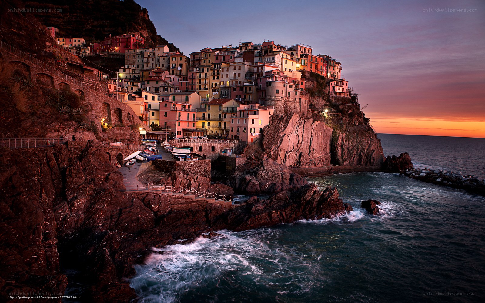 Village on a cliff at sunset