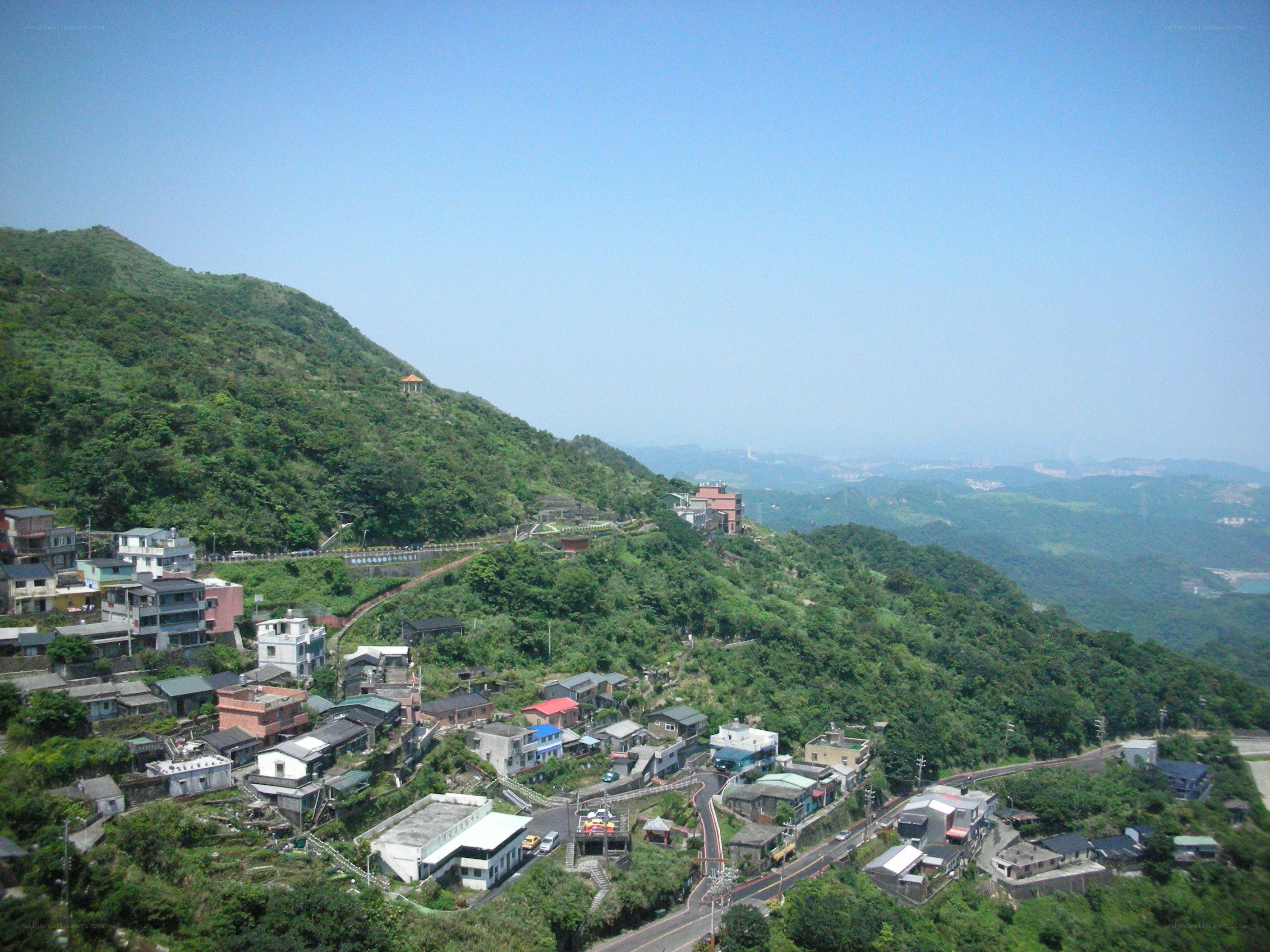village on a green hillside