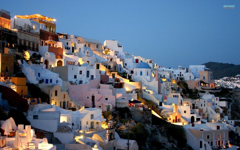 village on a hill at dusk