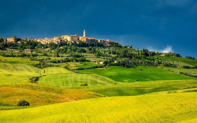 Village on a Hill — Green, Dramatic, Afternoon, Photograph, Hills