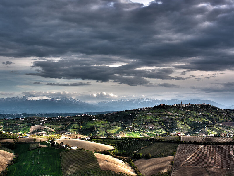 Village on a Hill — Green, Dramatic, Afternoon, Photograph